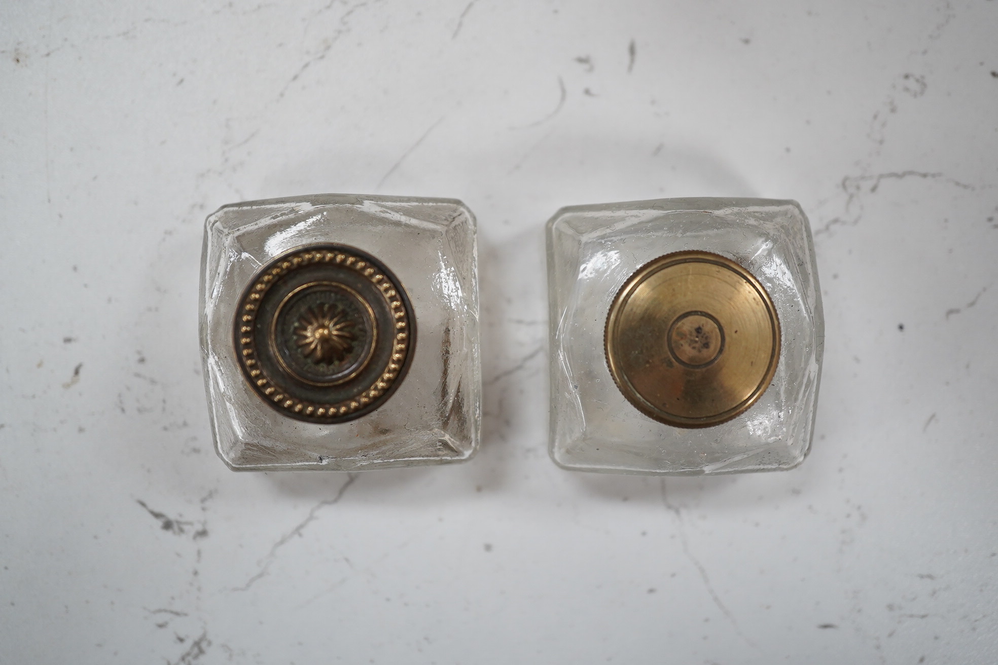 A mahogany brass mounted 19th century writing box and a walnut inlaid and mother of pearl writing box, brass mounted box, 35cm wide. Condition - exterior good, felt on slope torn.